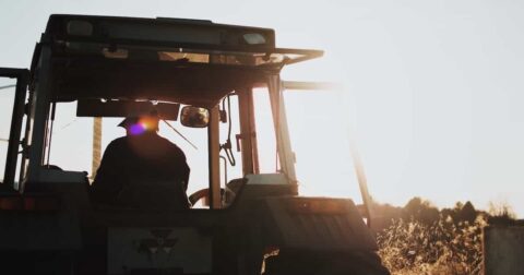 farmer tractor field