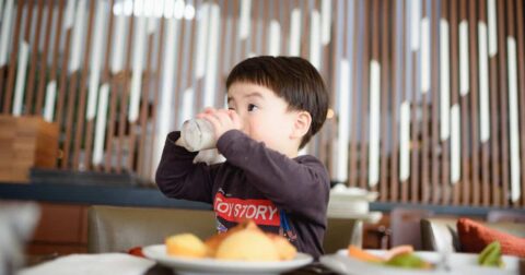 kid drinking milk