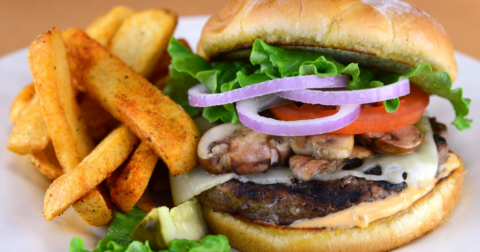 Mushroom swiss burger and fries