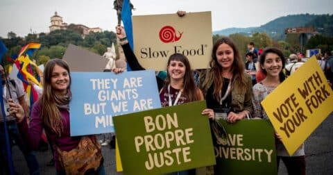 A group with Slow Food signs