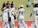 Pakistan celebrate a wicket during third Test against England on October 26.