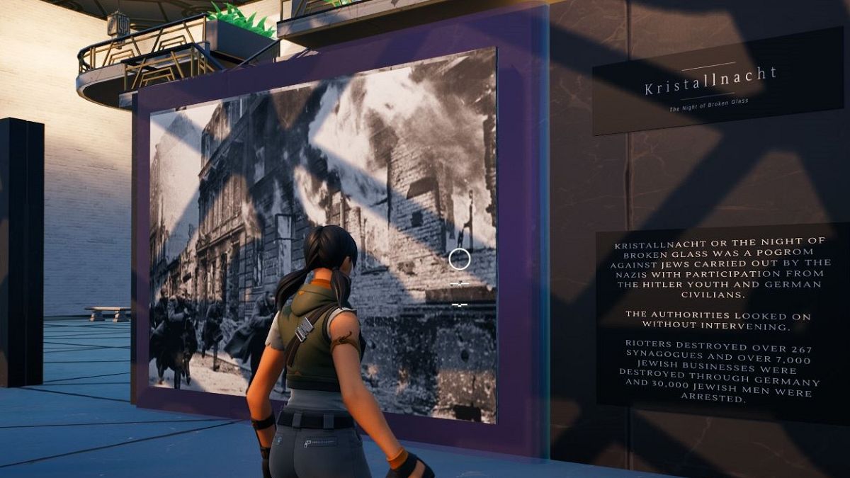 A character interact with a Kristallnacht display