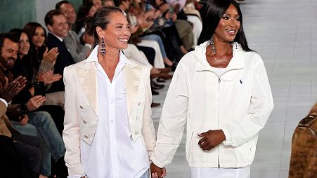 Christy Turlington, left, and Naomi Campbell walk the runway during the Ralph Lauren Spring/Summer 2025 fashion show.