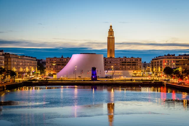 <p>The Volcan theater and St Joseph’s Church at nightfall</p>