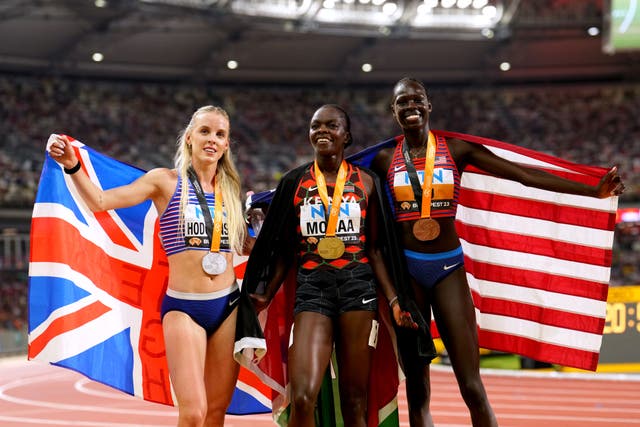 Keely Hodgkinson, left, celebrates with Mary Moraa (centre) and Athing Mu. (Martin Rickett/PA)