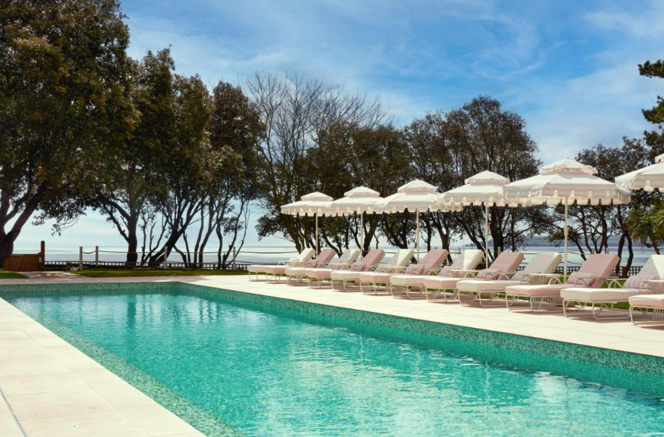 The Nici’s heated outdoor pool, ringed by bubblegum-pink parasols, is a joy