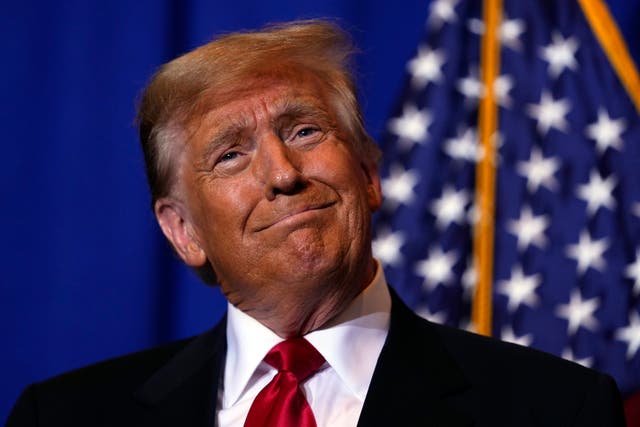 <p>All smiles: Republican presidential candidate Donald Trump at a campaign event in Atkinson, New Hampshire</p>