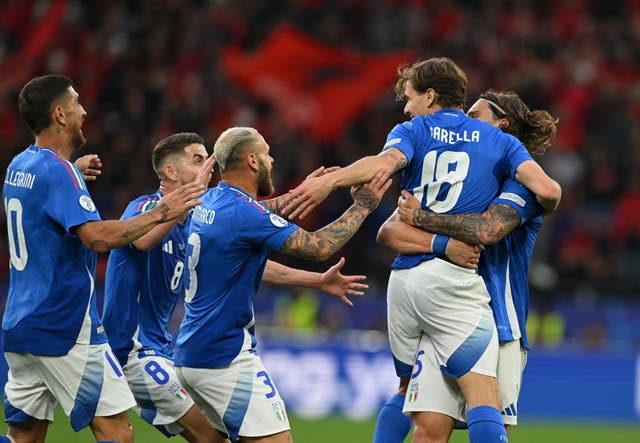 <p>Nicolo Barella celebrates scoring Italy’s second goal against Albania </p>