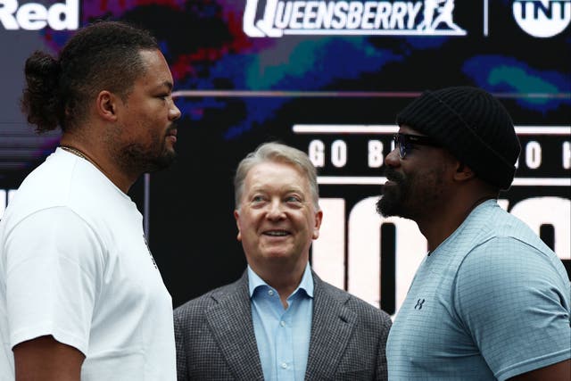 <p>Joe Joyce (left) facing off with Derek Chisora</p>