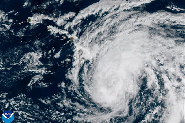 <p>An image provided by the National Oceanic and Atmospheric Administration shows Tropical Storm Hone as it continues to track to the west toward the Hawaiian Islands, Saturday, Aug. 24, 2024</p>