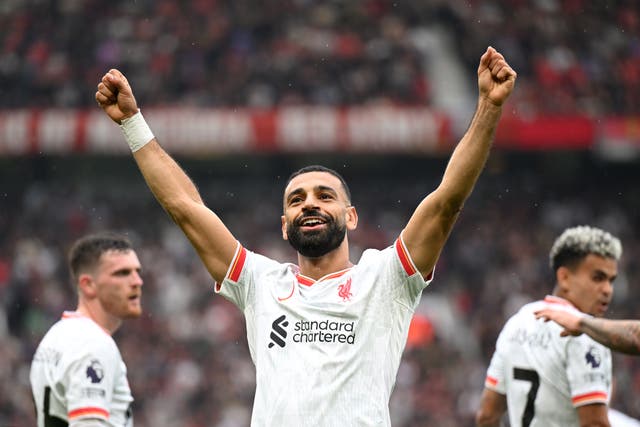 <p>Mohamed Salah celebrates after scoring the third Liverpool goal</p>