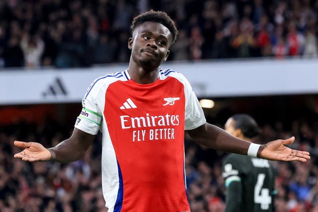 <p>Bukayo Saka after he scores the opening goal of the match </p>