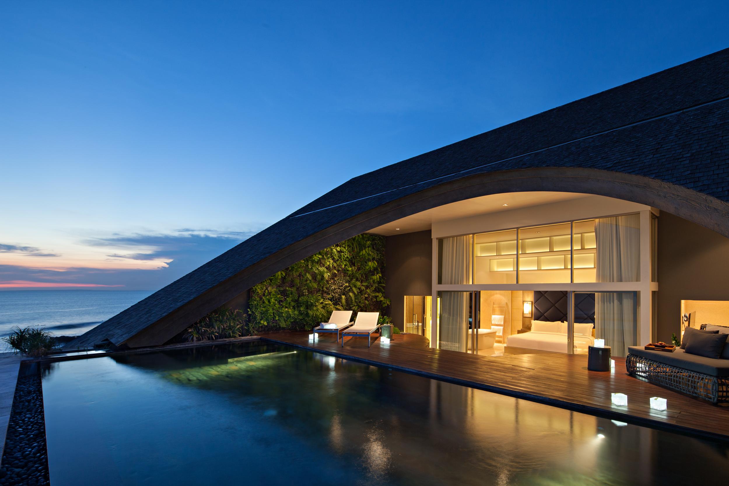 The penthouse master bedroom and pool at Como Uma Canggu