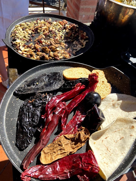 Chillies blistering on a red-hot pan