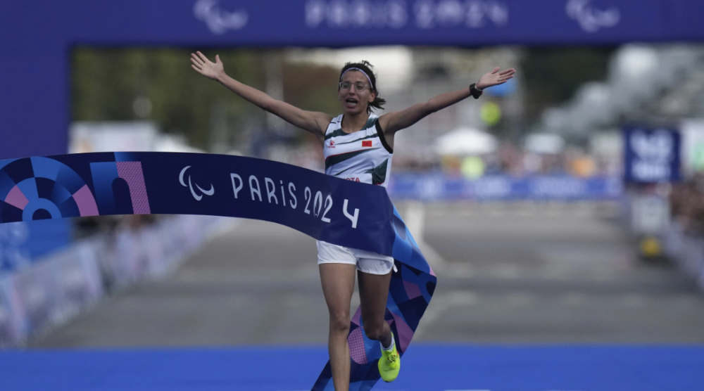 Morocco's Fatima Ezzahra El Idrissi wins the women's marathon T12 at the 2024 Paralympics, Sunday, Sept. 8, 2024, in Paris, France. (AP Photo/Thibault Camus)