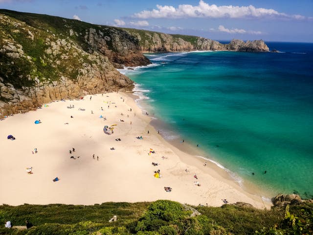 <p>Pop a parasol on Porthcurno’s white sands </p>