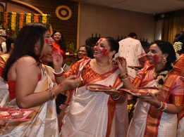 Women perform the ritual of Sindoor Khela