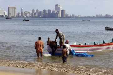 Fishermen return with their morning catch