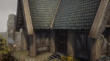 House outside the Drunken Huntsman now has alpha and better vertex colours. Whiterun Mesh Fixes also fixes this.