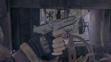 Notice how the barrel tilts. RE4 recreates the behavior of the short recoil mechanism, which is amazing.