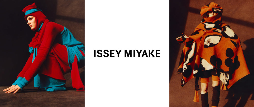 Left: Model crouched down wearing blue and red INTERPLAY dress under matching tunic and beanie with a red balaclava underneath. Centre: ISSEY MIYAKE logo in black on white background. Right: Model wearing VIGOR print coat in white, black and brown-ish orange with matching gloves and hat. Worn over INTERPLAY shorts and socks in black and brown-ish orange. 