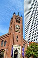 Old St. Mary's church and skyscraper