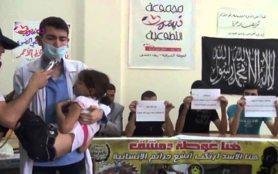 Assad supporters use an acting scene to question the regimes' use of chemical weapons