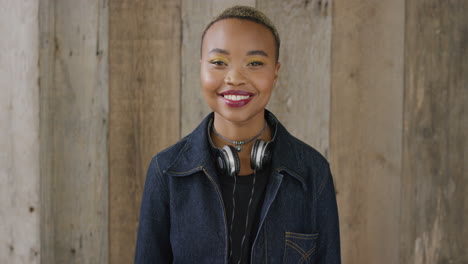 portrait of confident african american woman smiling enjoying lifestyle successful black student girl wearing trendy fashion slow motion real people series