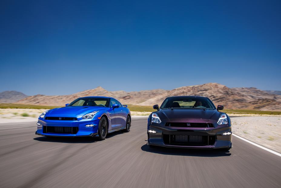 Front end image of two Nissan 2024 GT-R Special Editions on a track with mountains and blue sky in background