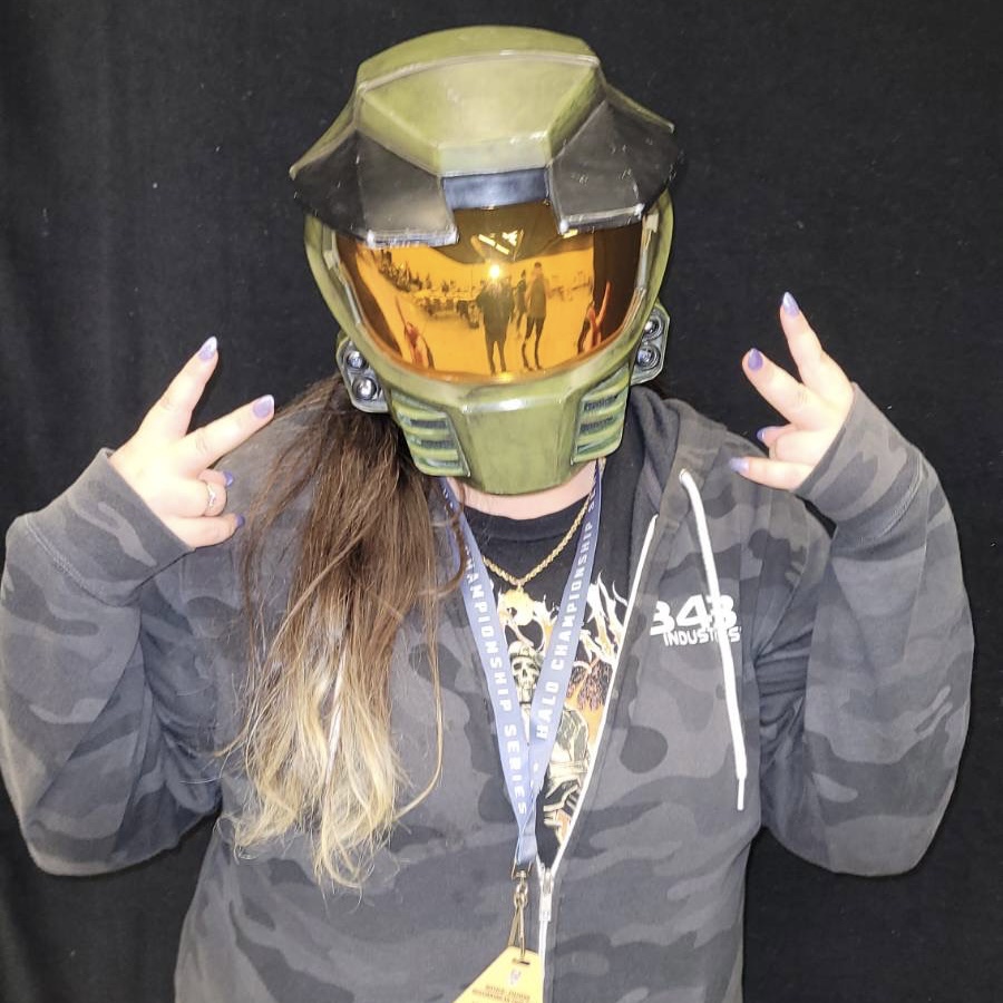 Sam wearing a Master Chief helmet