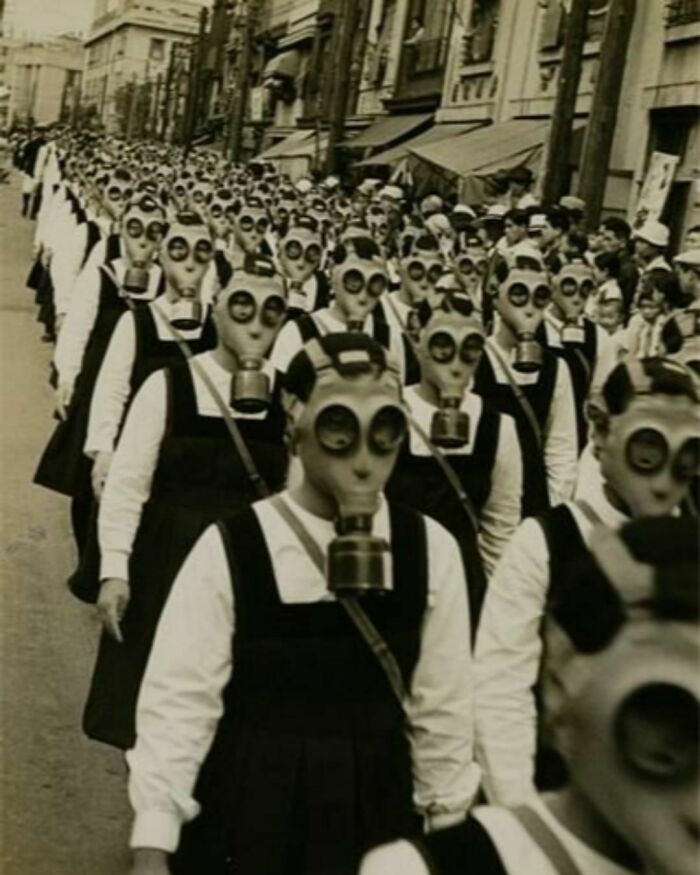 School Girls In Gas Masks. World War 2