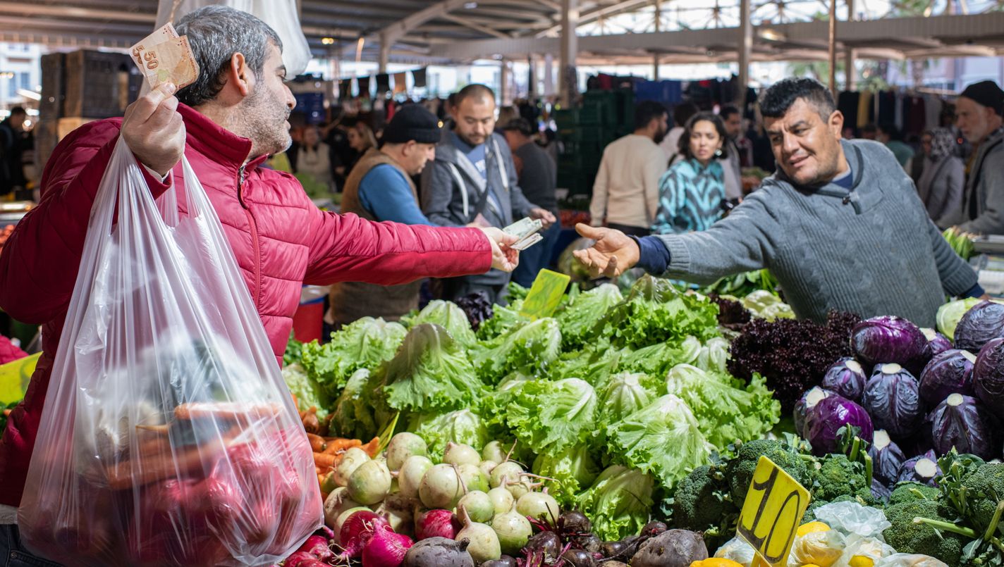 On 28 December 2022, people went shopping in a street market in the Konyaalti district of Antalya, Turkey. Shoppers, merchants and small business owners have been adjusting to pressure from inflation and a weakening Turkish lira, resulting in higher consumer prices for food products and other goods. (Photo by Diego Cupolo/NurPhoto via Getty Images)