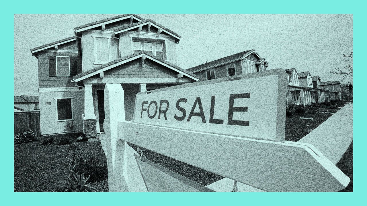 A "For Sale" sign is posted in front of a home in Sacramento, California, USA