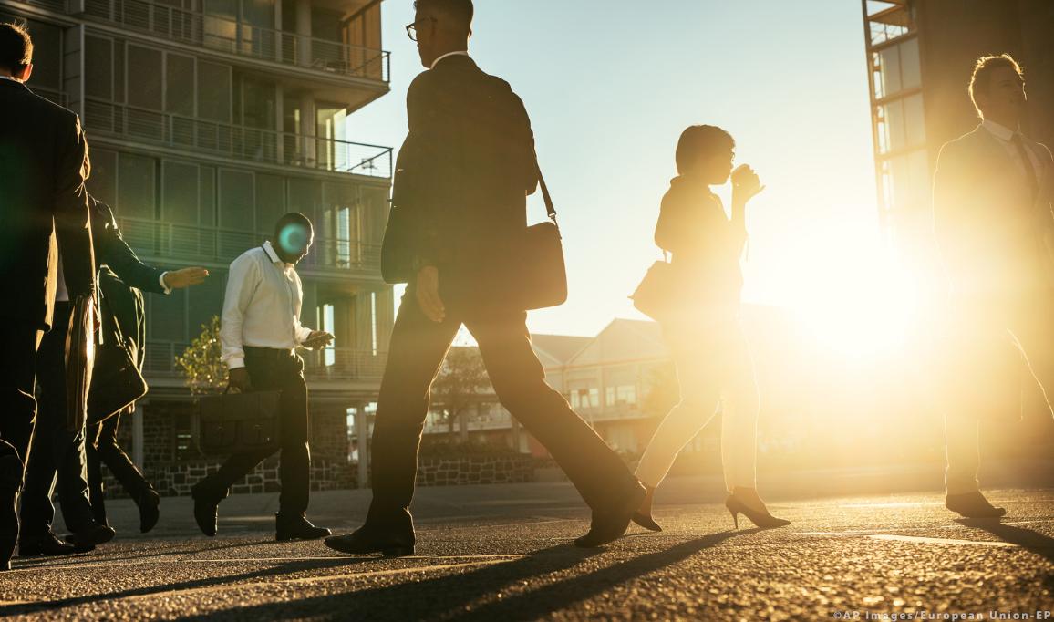 People walking on a street early in the morning ©AP Images/European Union-EP