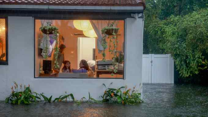 Floodwaters surround a home in Hollywood, Florida, last month