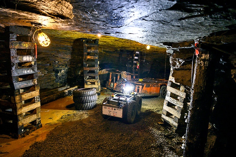 The image shows the underground rescue robot making its way through the test mine. (Credit: Carnegie Mellon)