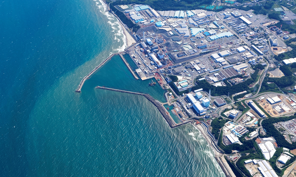 Nuclear-contaminated wastewater is being dumped from the TEPCO Fukushima Daiichi nuclear power plant into the ocean. An aerial view showing that the discharge is causing discoloration in Okuma, Fukushima, Japan on August 24, 2023. Photo: VCG    