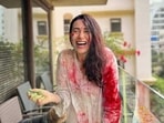 Karisma Kapoor shared several pictures to show how her Holi celebration started and how it was going. She celebrated Holi with her kids at home. 