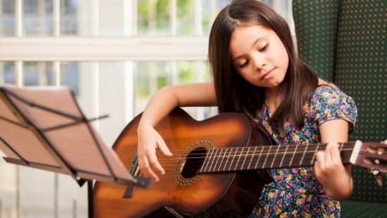 Learning guitar can be a rewarding experience for kids, but it can also be challenging and require a lot of discipline. Here are five tips to make learning guitar fun for kids: (Unsplash)