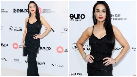 Preity Zinta recently made a glamorous appearance at the star-studded Elton John AIDS Foundation Oscar Party. For the occasion, the actor donned a stunning black tassel gown from the luxury line of Dior. (Instagram/@realpz)