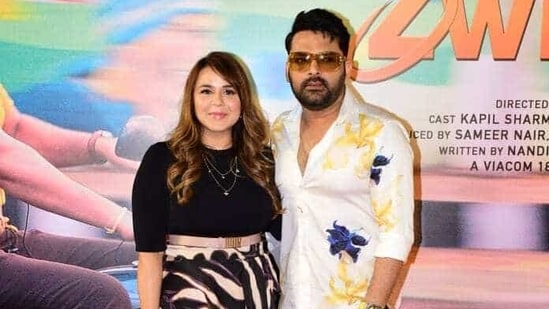 <p>Kapil Sharma was joined by his wife Ginni Chatrath as well. She arrived in a black dress and the couple went on to pose together for the paparazzi. She also styles him for his public appearances. (Varinder Chawla)</p>