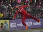 Sikandar Raza jumps take a catch on the boundary line during the Indian Premier League 2023 match between Punjab Kings and Rajasthan Royals(AP)