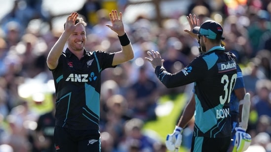 New Zealand's Adam Milne (L) celebrates with teammates after taking a wicket during the second Twenty20 international cricket match between New Zealand and Sri Lanka in Dunedin on April 5, 2023. (Photo by Sameera PEIRIS / AFP)(AFP)