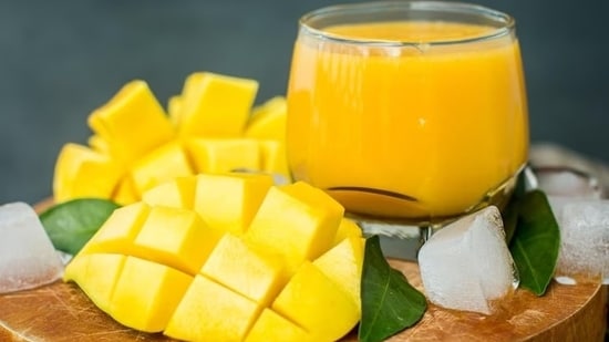 As the summer season arrives, the delectable and luscious flavor of mangoes beckons us to relish them. Mangoes hold a significant cultural significance in India and have been a part of our gastronomical landscape for centuries. While traditional mango delicacies such as mango shakes, aamras, and mango lassi are widely popular, there exist a few offbeat mango recipes that one can explore and experiment with during this season. Sarita Bazaz, Founder of The Food Affairs, shared with HT Lifestyle, some offbeat mango recipes that can be savored during the summer season.(Freepik)