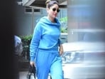 Actor Kareena Kapoor arrived in Mumbai on Monday along with Rhea Kapoor. She was spotted at the Kalina airport in the city. For the travel, Kareena opted for a blue sweatshirt, matching pants, and white sneakers. She also carried a bag and wore dark sunglasses.