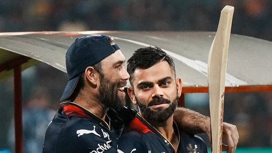 Virat Kohli and Glenn Maxwell before the start of the IPL 2023 cricket match between Royal Challengers Bangalore and Gujarat Titans, at M Chinnaswamy Stadium in Bengaluru(PTI)