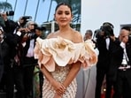 Several Indian celebrities made their Cannes debut this year, including Anushka Sharma. She graced the red carpet in a Richard Quinn gown and her minimal red carpet look was praised by many on social media. (AFP)