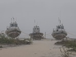 Gujarat Police boats are seen anchored on the shore as heavy rain lashes the Jakhau port ahead of the landfall of Cyclone Biparjoy, in the Kutch district, on June 12. According to the Indian Meteorological Department (IMD), the cyclone has 