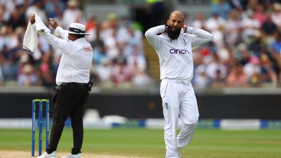 England's Moeen Ali reacts after Australia's Pat Cummins hits a six off his bowling(Reuters)