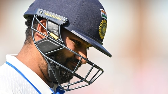 India's captain Rohit Sharma walks back to the pavilion after his dismissal (AFP)